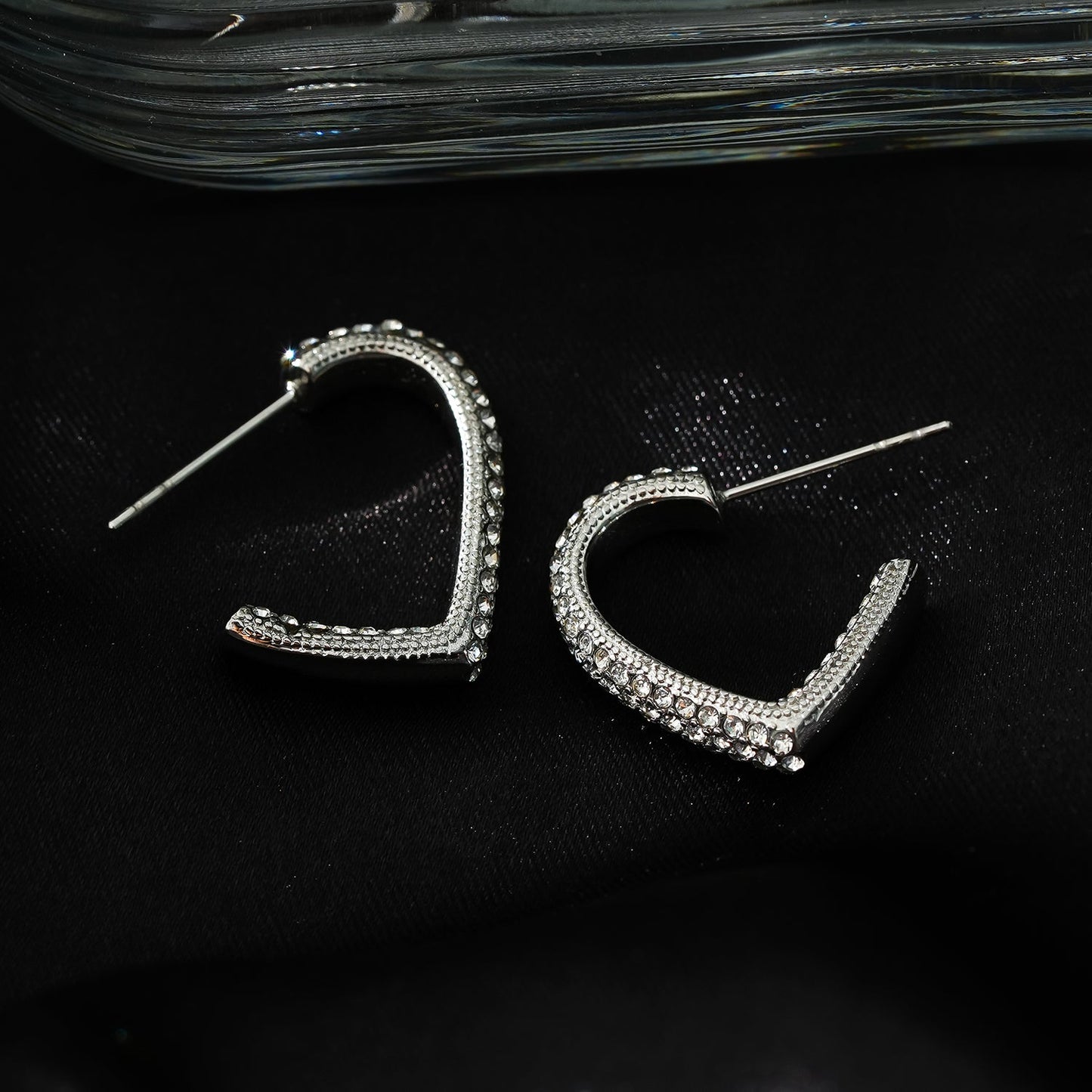 Style ANJAR White Gold (Silver Tone): Heart Shaped Hoops embedded with Zirconia Gemstones