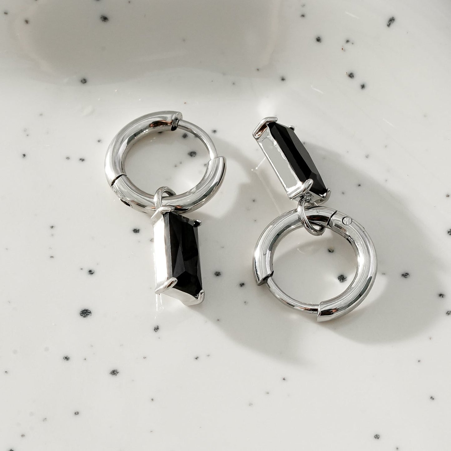 DAYSIA White Gold (Silver Toned): Vintage Inspired Encased Black Crystal Drop Earrings.