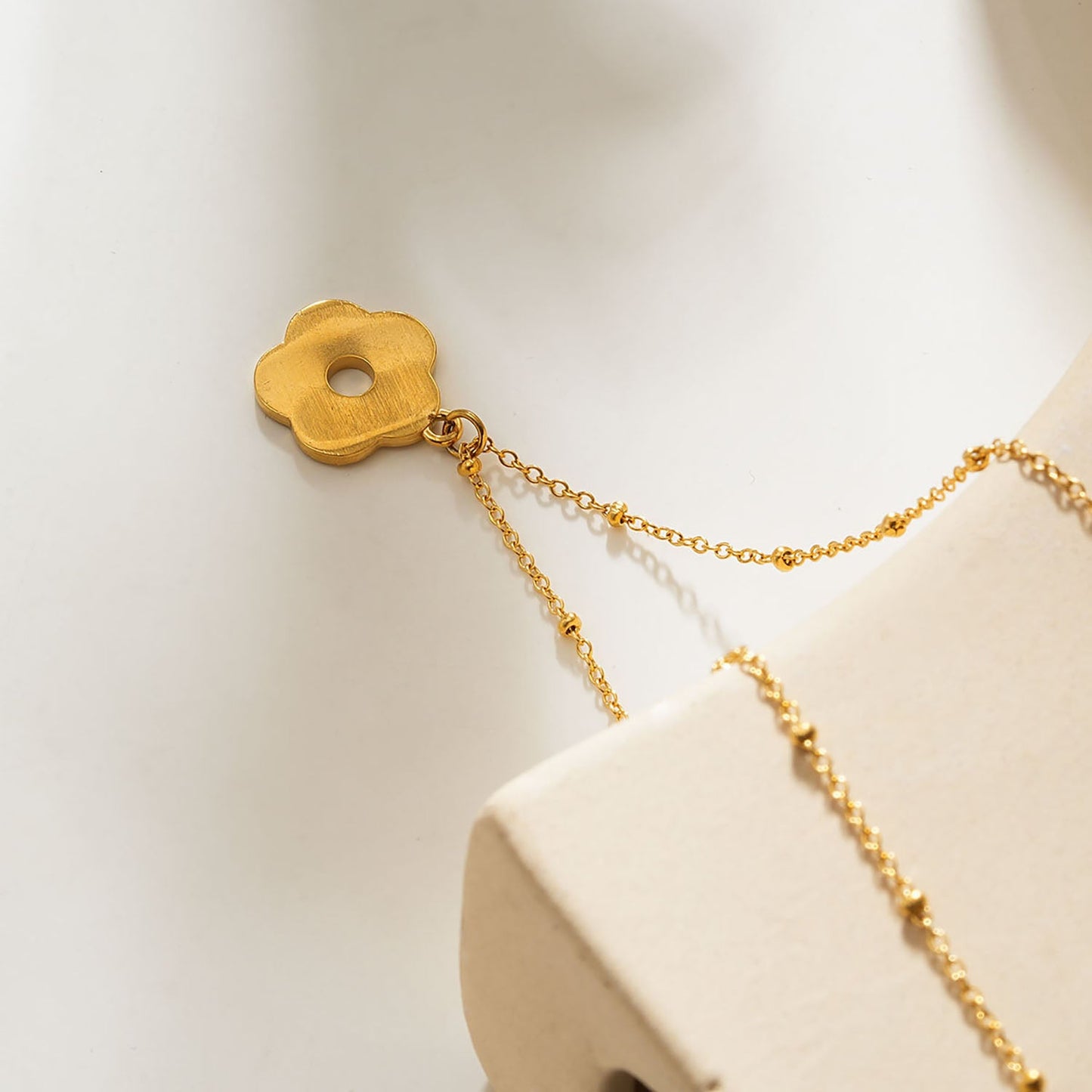 MELRINA Gold - Vintage Bloom: Beaded Chain Necklace with Pave Zirconia Flower Charm