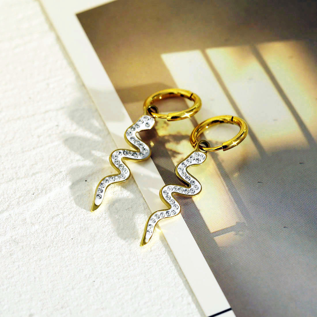 FANG: Zirconia Embedded Serpent Drop Earrings