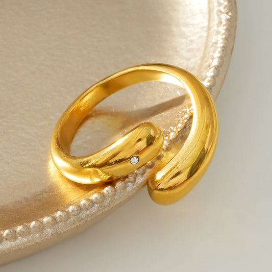 GARUVA: Modern Abstract Ring with Solitaire Zirconia Gemstone in Gold