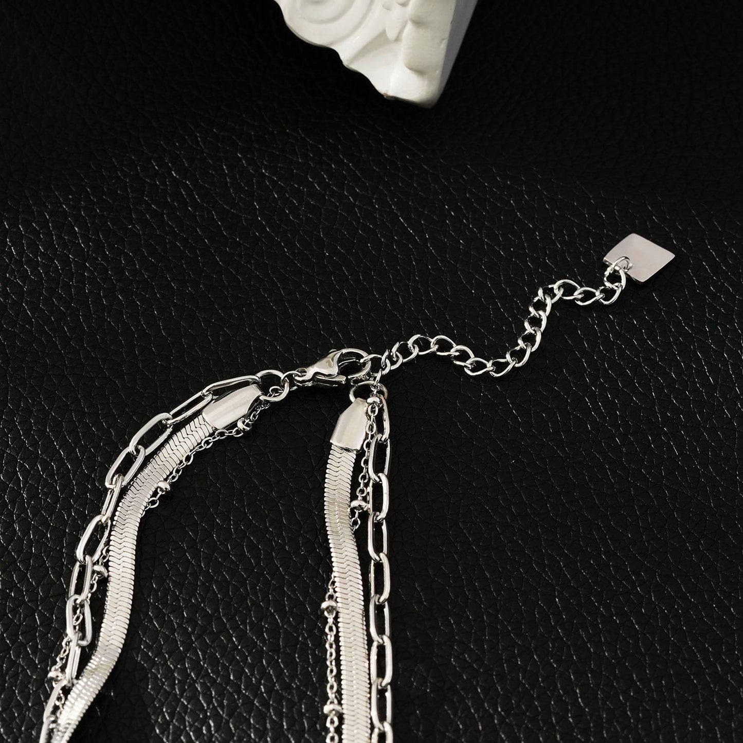 GEILNAR: Triple Layer Mixed-Chain Necklace in Silver