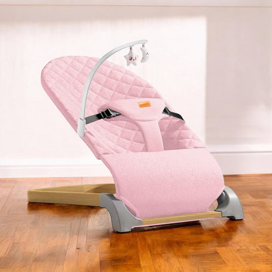 Ergonomic Quilted Baby Bouncer & Rocker with Removable Toy Bar, Adjustable Safety Harness , Baby Bouncinette (Pink)