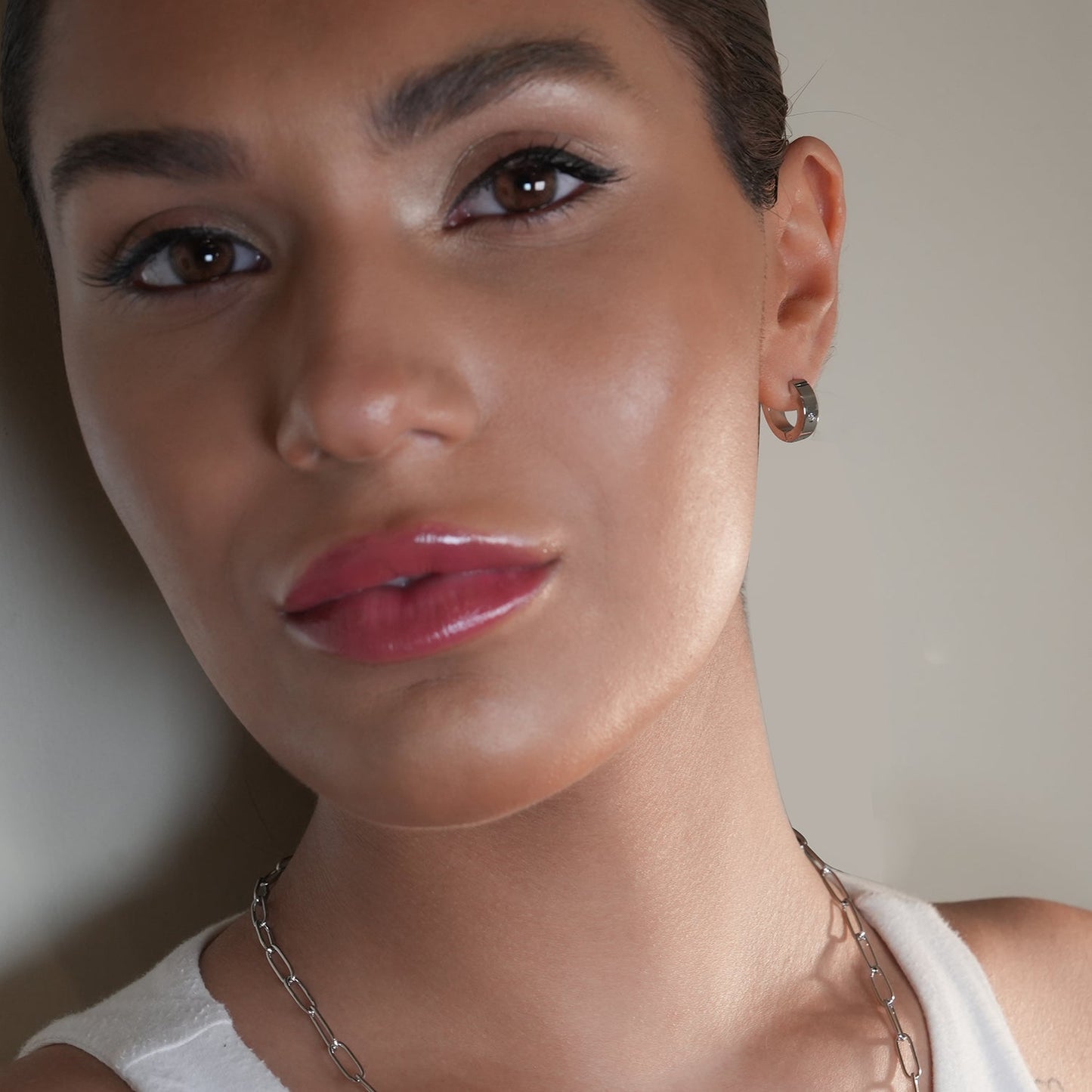 INIS: Wide Mini Hoop Earrings with a Solitaire Zirconia Gemstone in Silver