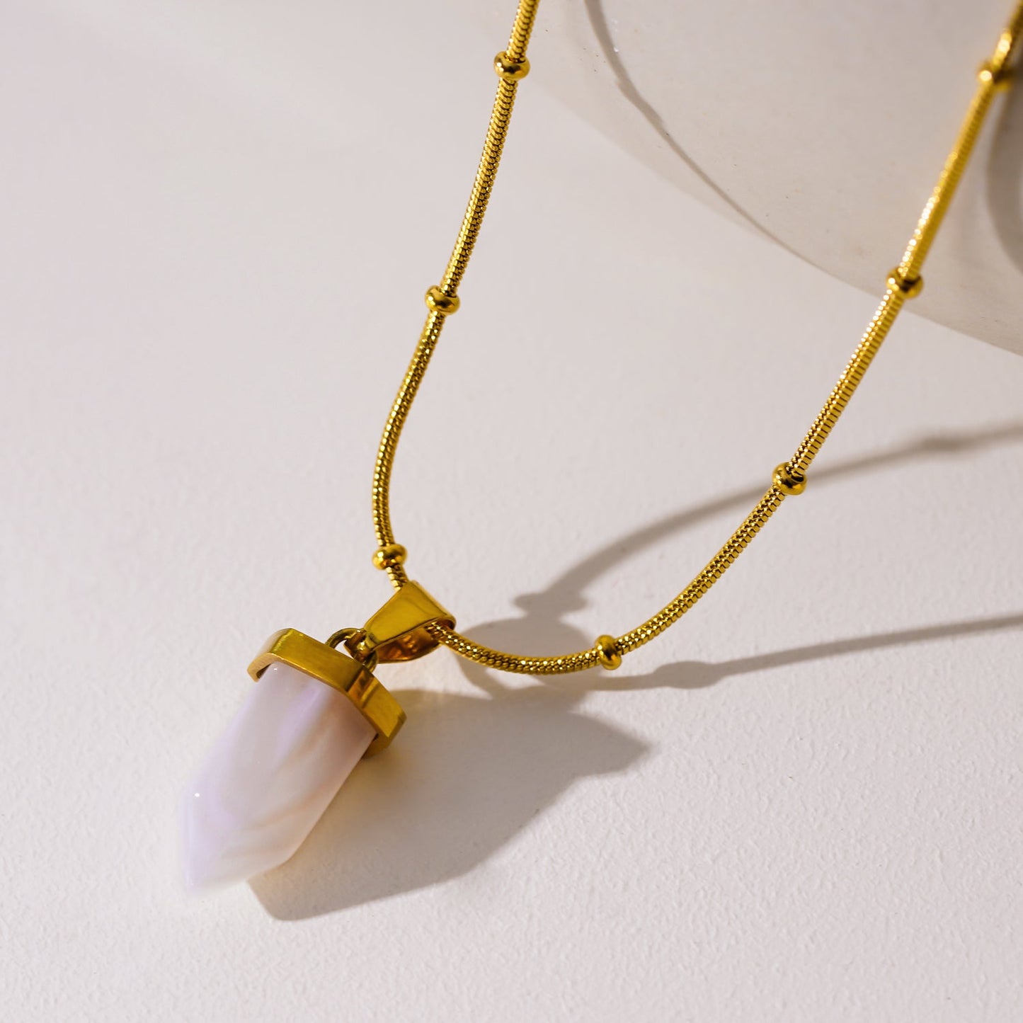 MAKEDA: Amethyst Stone Pendant Anchored on a Beaded Snake Skin Textured Chain Necklace