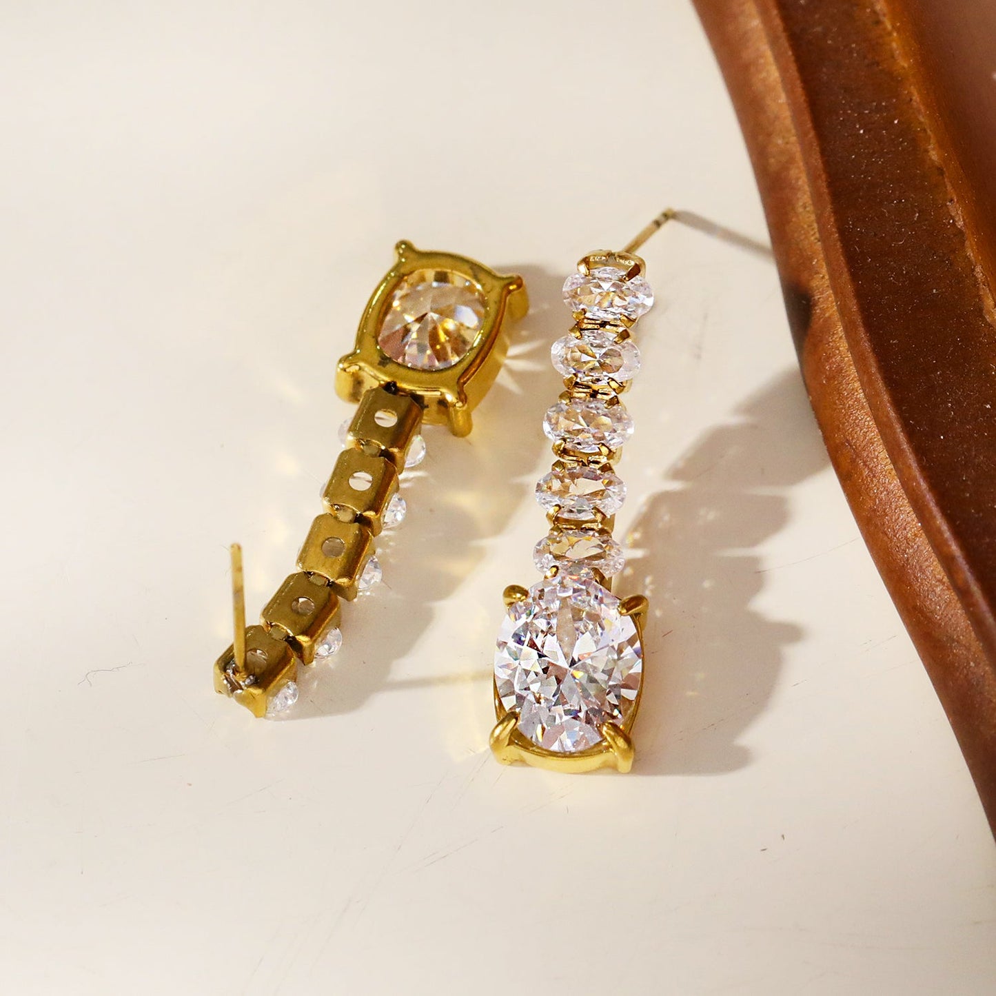 MALIA: Radiant Cascading Zirconia Drop Earrings