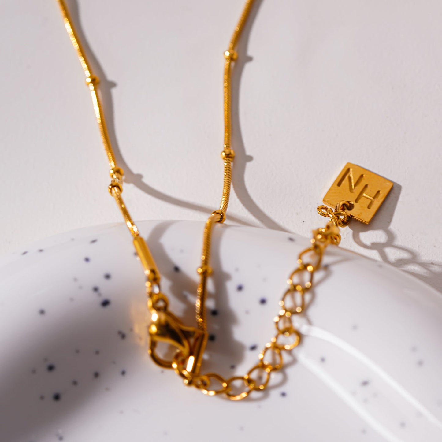 NAZINGA: Lace Agate Stone Pendant Anchored on a Beaded Snake Skin Textured Chain Necklace