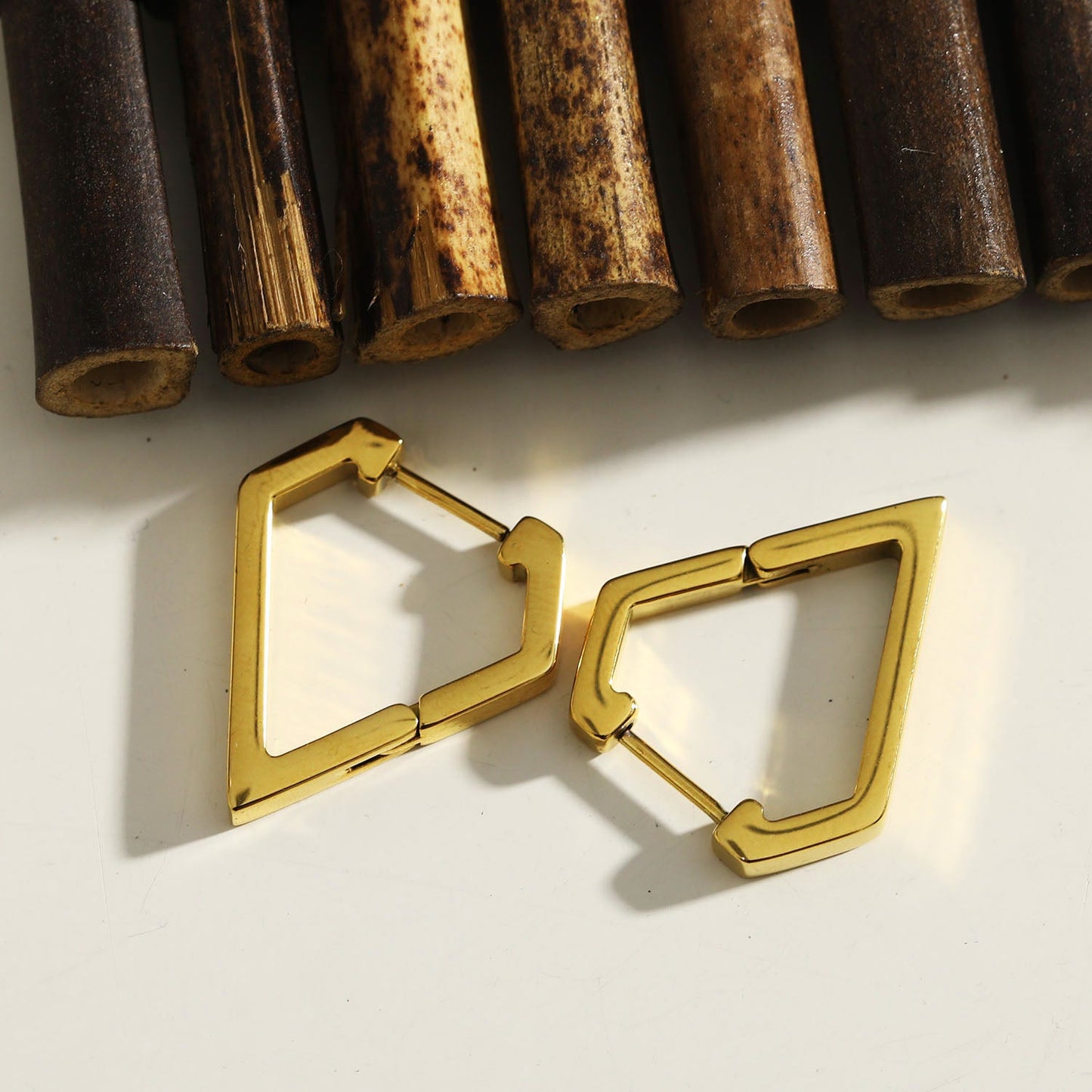 CAGLIARI: Triangle Shaped Contemporary Hoop Earrings in Gold