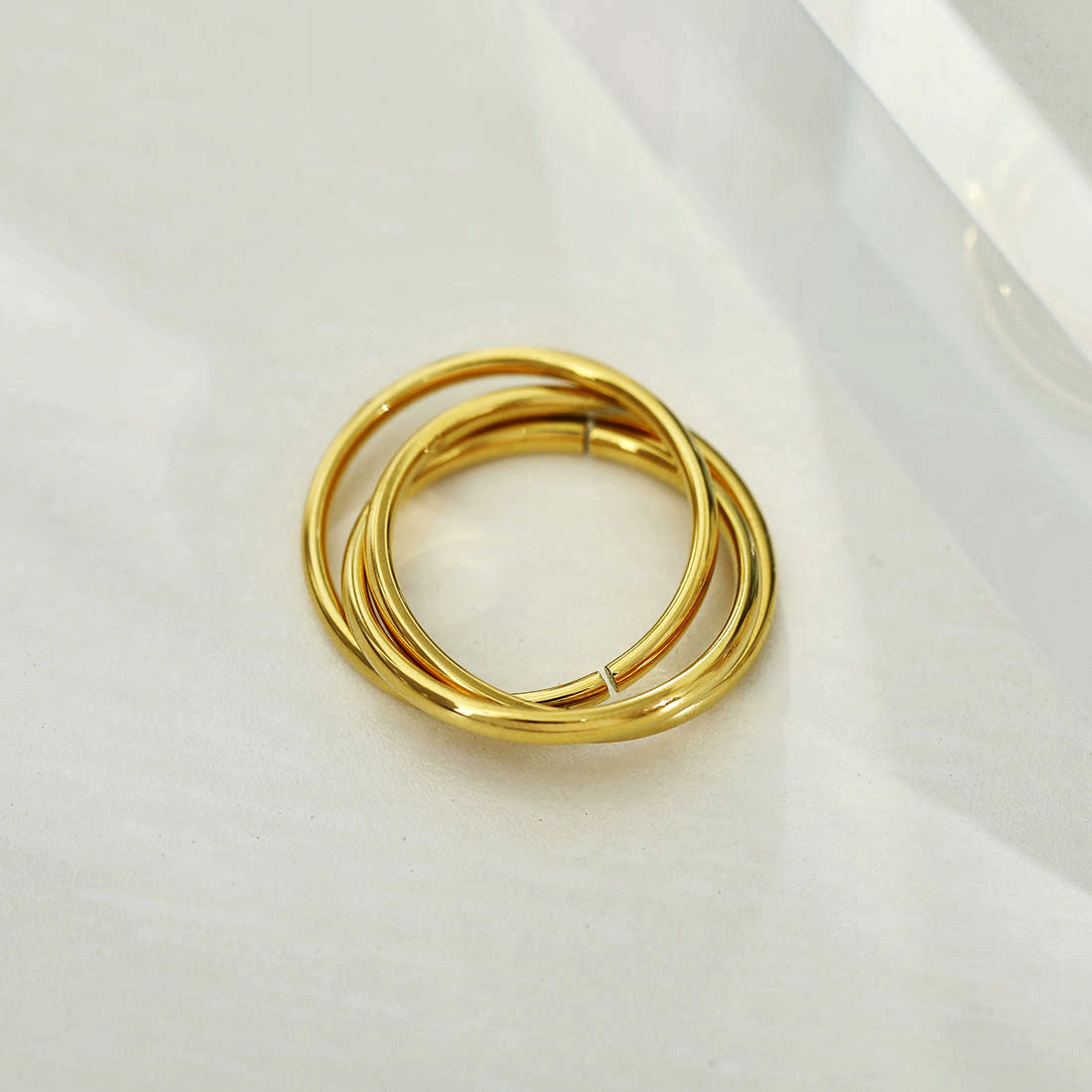 ESTELLA: Triple Banded Interconnected Stack Ring in Gold