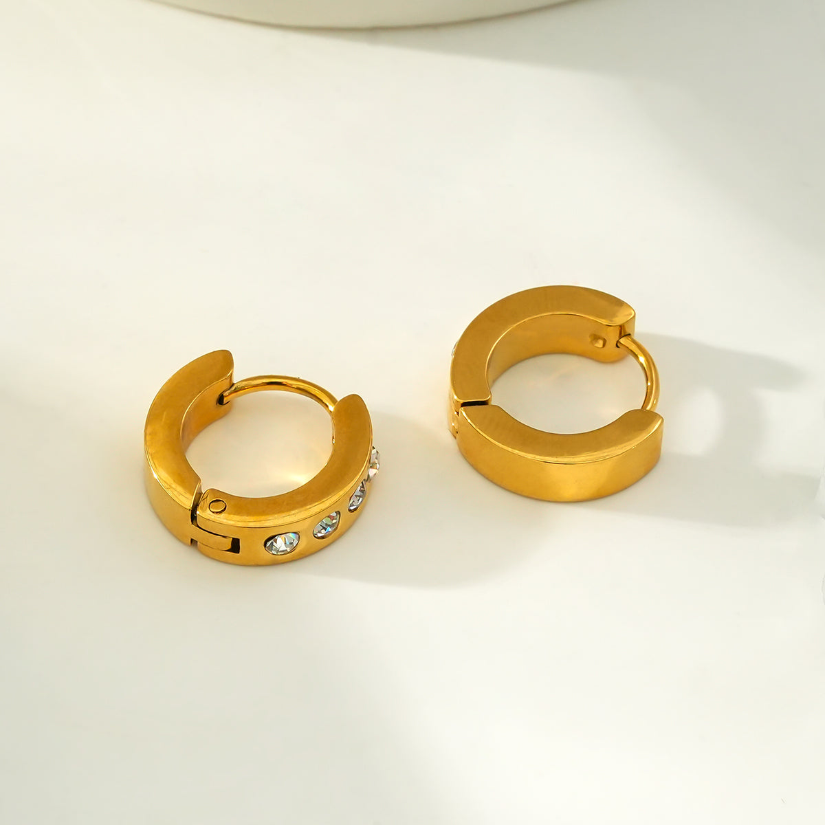 PAIA Gold: Wide Mini Hoop Earrings with an Array of Zirconia (CZ) Gemstones