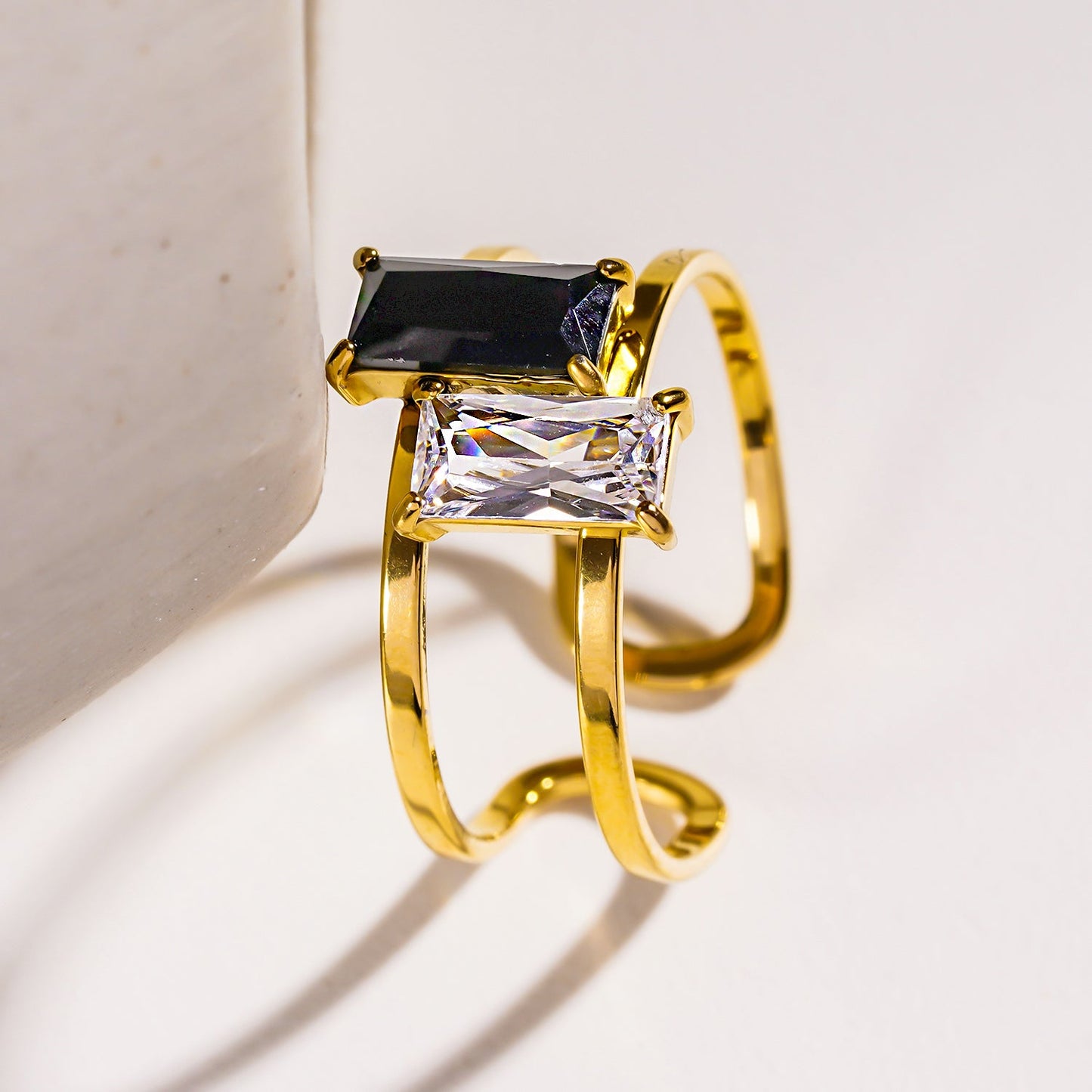 RIADEL: Dual-Radiance Black & Clear Zirconia Banded Ring