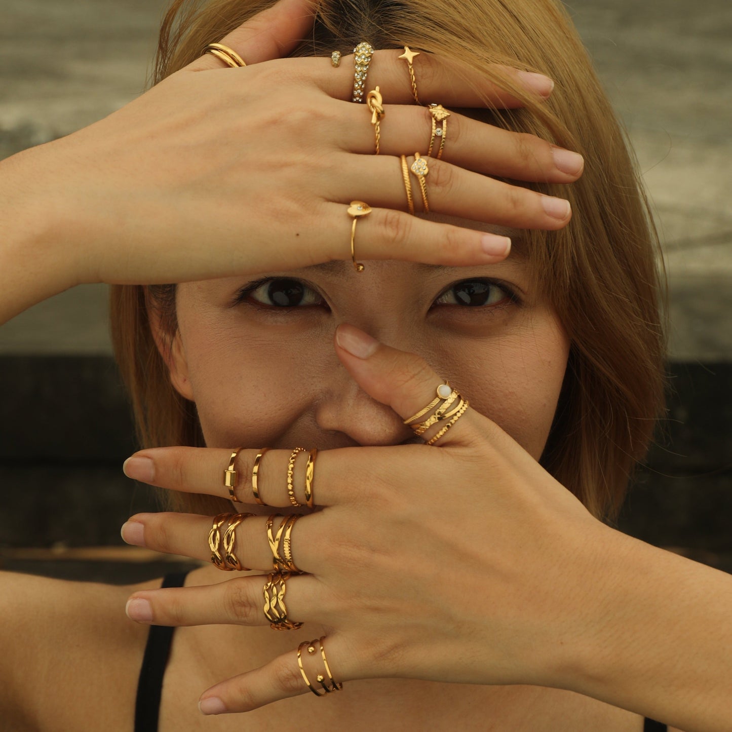 NADIA Gold: Multi Stacked Ring with a Stone Centre Piece