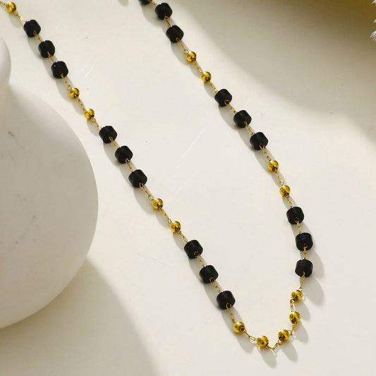 SANTA CRUZ Black: Gold & Black Onyx Beaded Chain Necklace