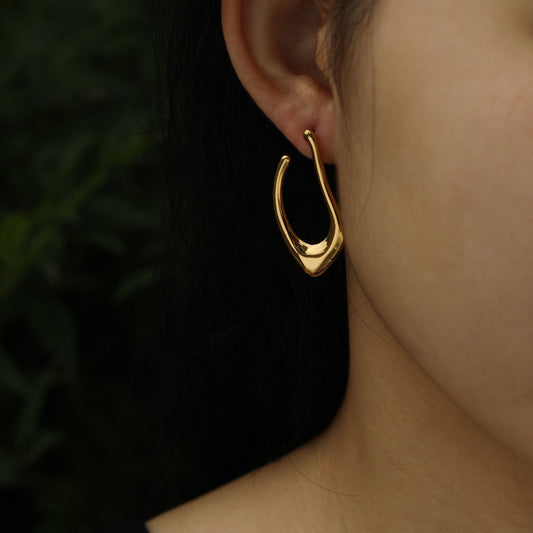 TARAJI Abstract Shaped Hoop Earrings in Gold