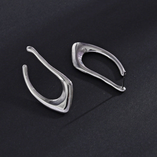 TARAJI Abstract Shaped Hoop Earrings in Silver