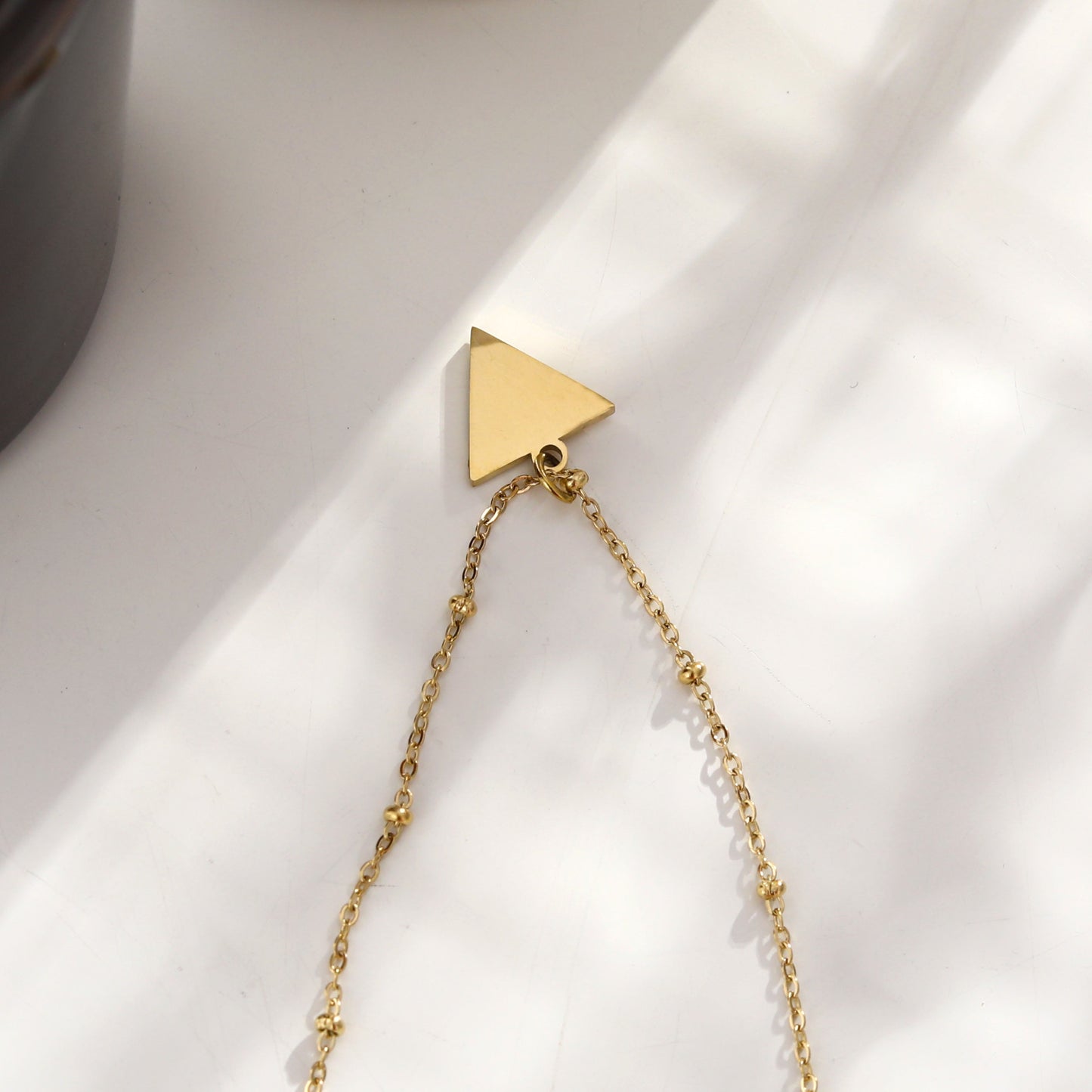 URIKA Beaded Chain Necklace with Zirconia Pavé Triangle Pendant in Gold
