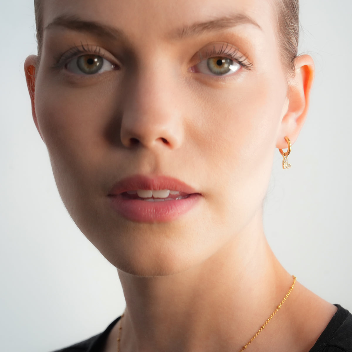 VIRTUOUS Gold: Mini Hoops with Zirconia Embedded Heart Charm