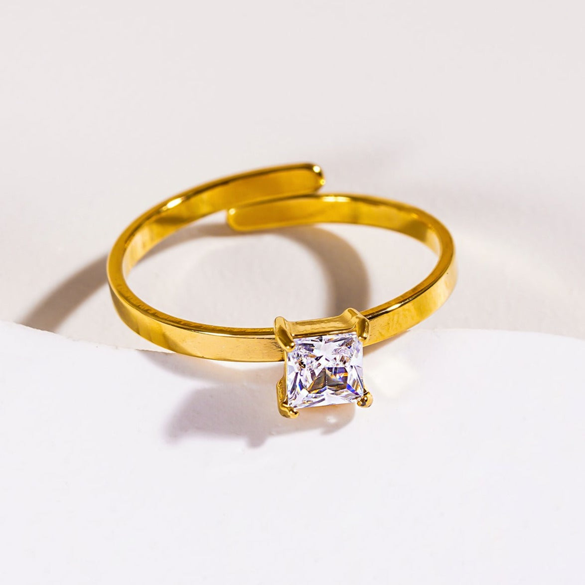 ADHIKA: Classic Gold Ring with a Square Zirconia Centerpiece