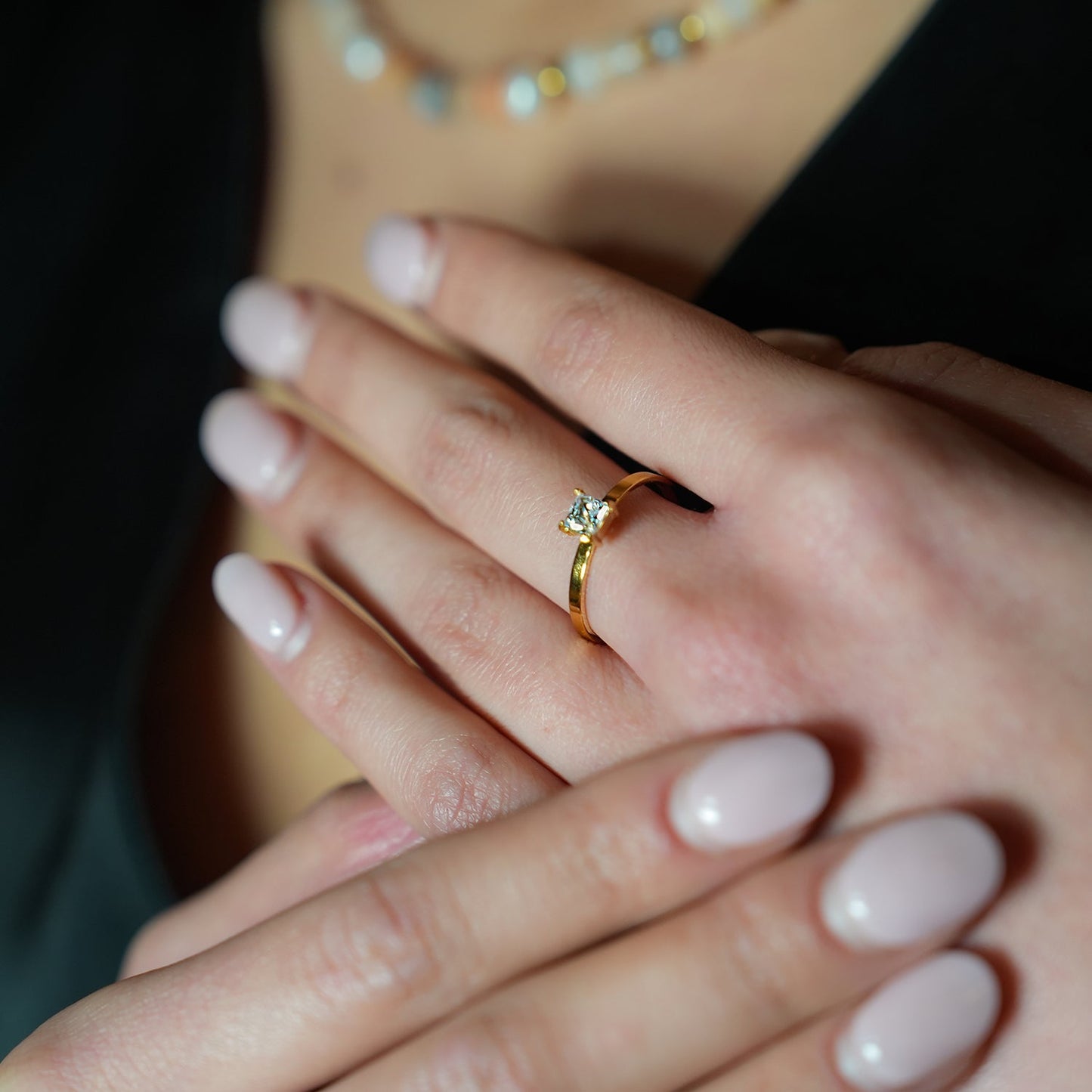 ADHIKA: Classic Gold Ring with a Square Zirconia Centerpiece