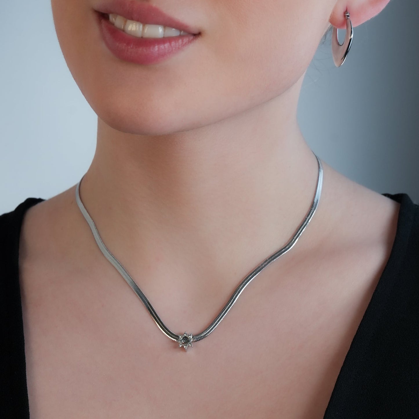 AGULHAS White Gold (Silver Toned): Celestial Elegance - Snake Skin Chain Necklace with Zirconia Embedded Star Charm