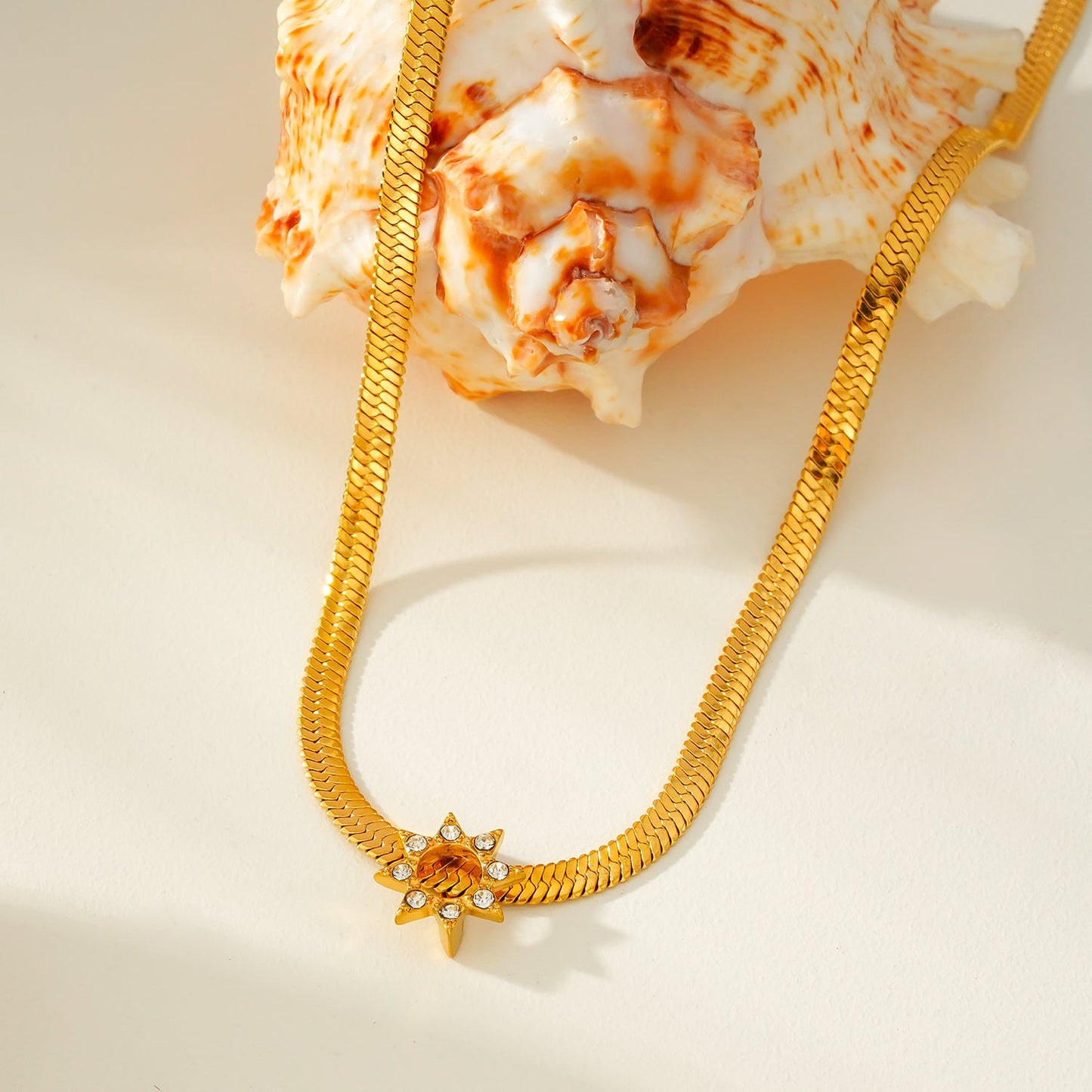 AGULHAS Gold: Celestial Elegance - Snake Skin Chain Necklace with Zirconia Embedded Star Charm