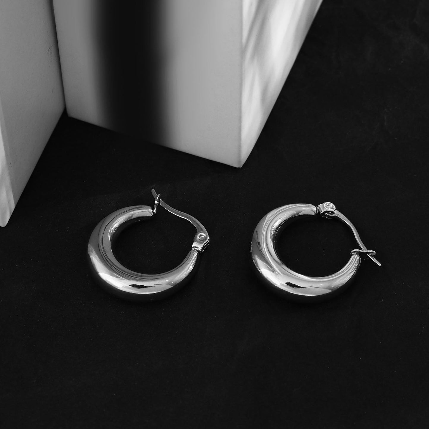 AMBER-MESSINA Chunky Hoop Silver Earrings