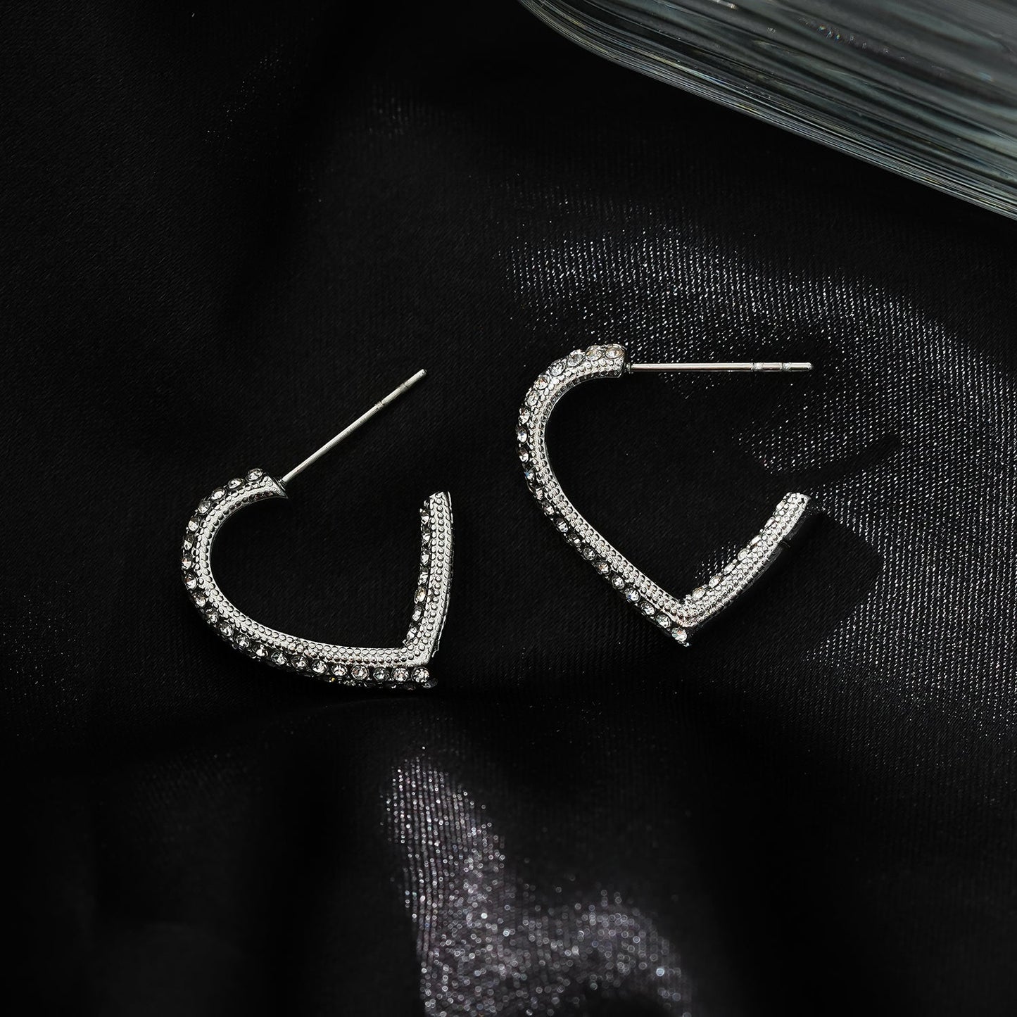 Style ANJAR White Gold (Silver Tone): Heart Shaped Hoops embedded with Zirconia Gemstones