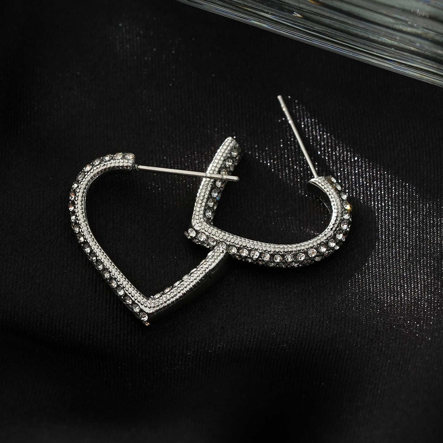 Style ANJAR White Gold (Silver Tone): Heart Shaped Hoops embedded with Zirconia Gemstones