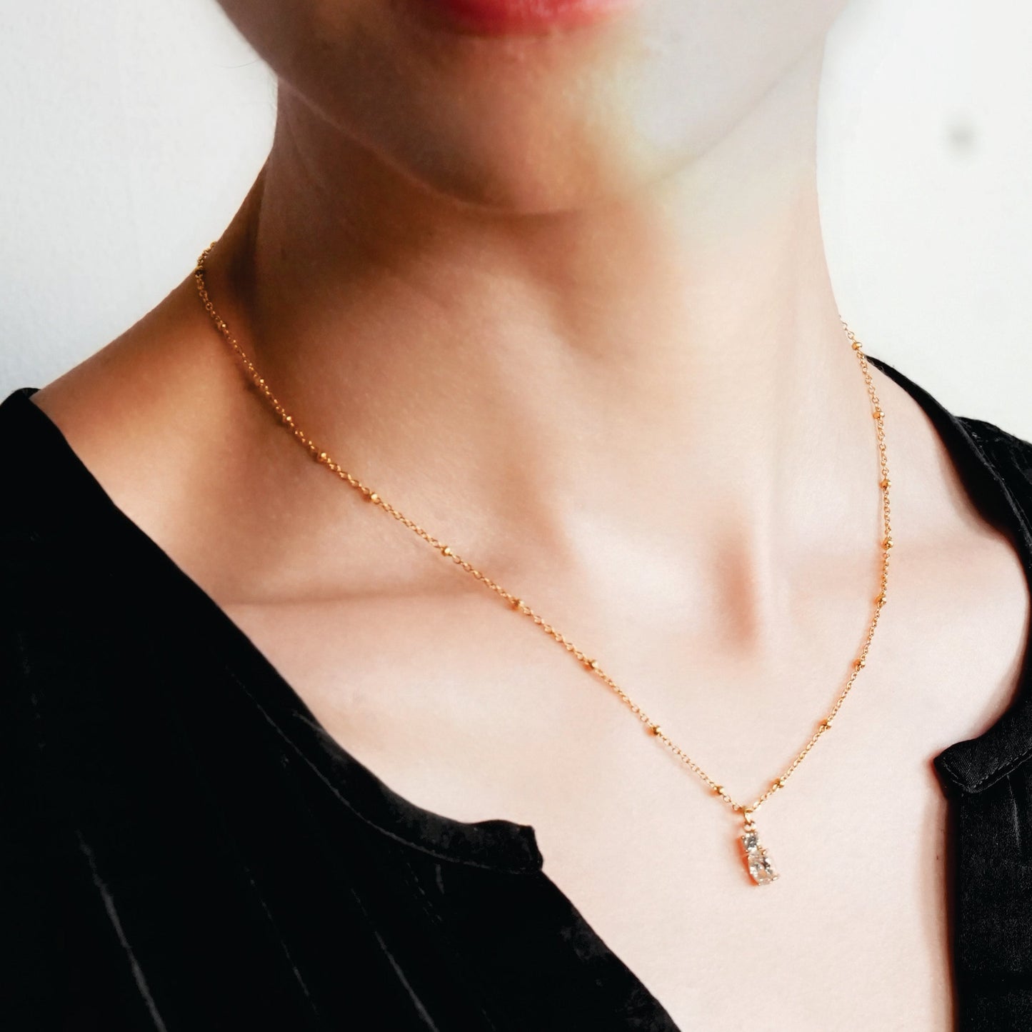 CABBANA Gold:  A Duo Set of Zirconia Charm Pendants on a Beaded Chain Necklace