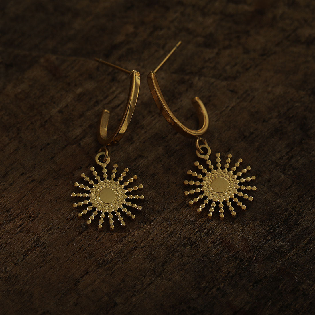 CHARLIE Gold: Semi Hoops with a Sun Symbol Charm