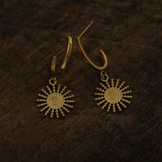 CHARLIE Gold: Semi Hoops with a Sun Symbol Charm
