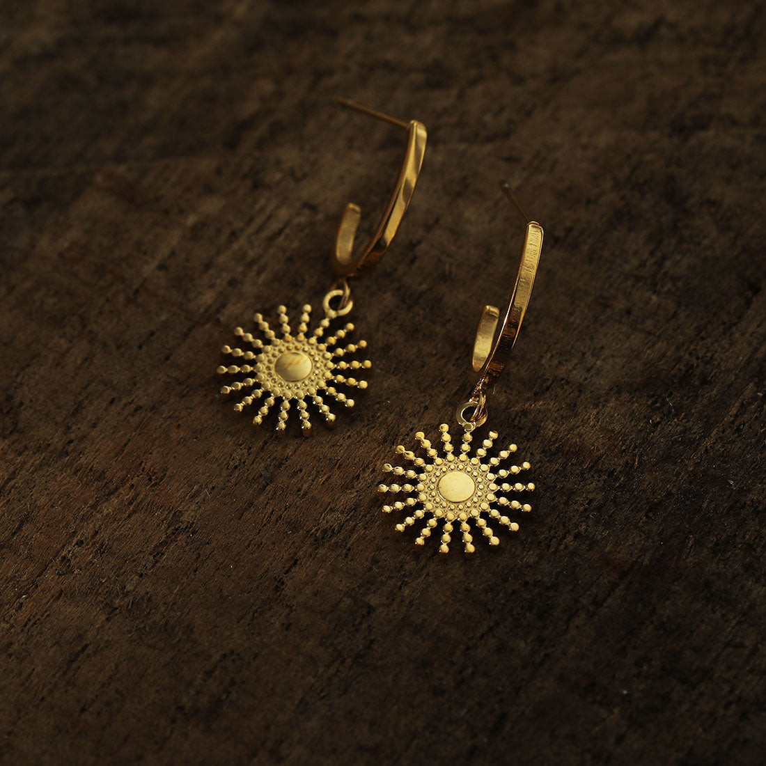 CHARLIE Gold: Semi Hoops with a Sun Symbol Charm