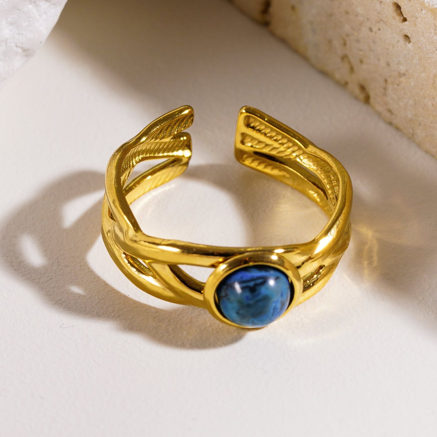 CHESA: Twisted Stacked Ring with Natural Stone Centre Piece.