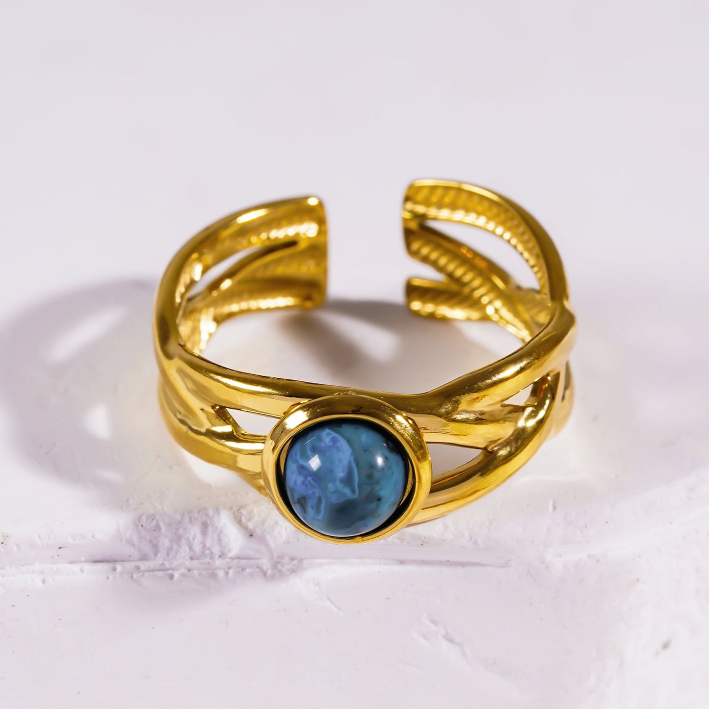 CHESA: Twisted Stacked Ring with Natural Stone Centre Piece.