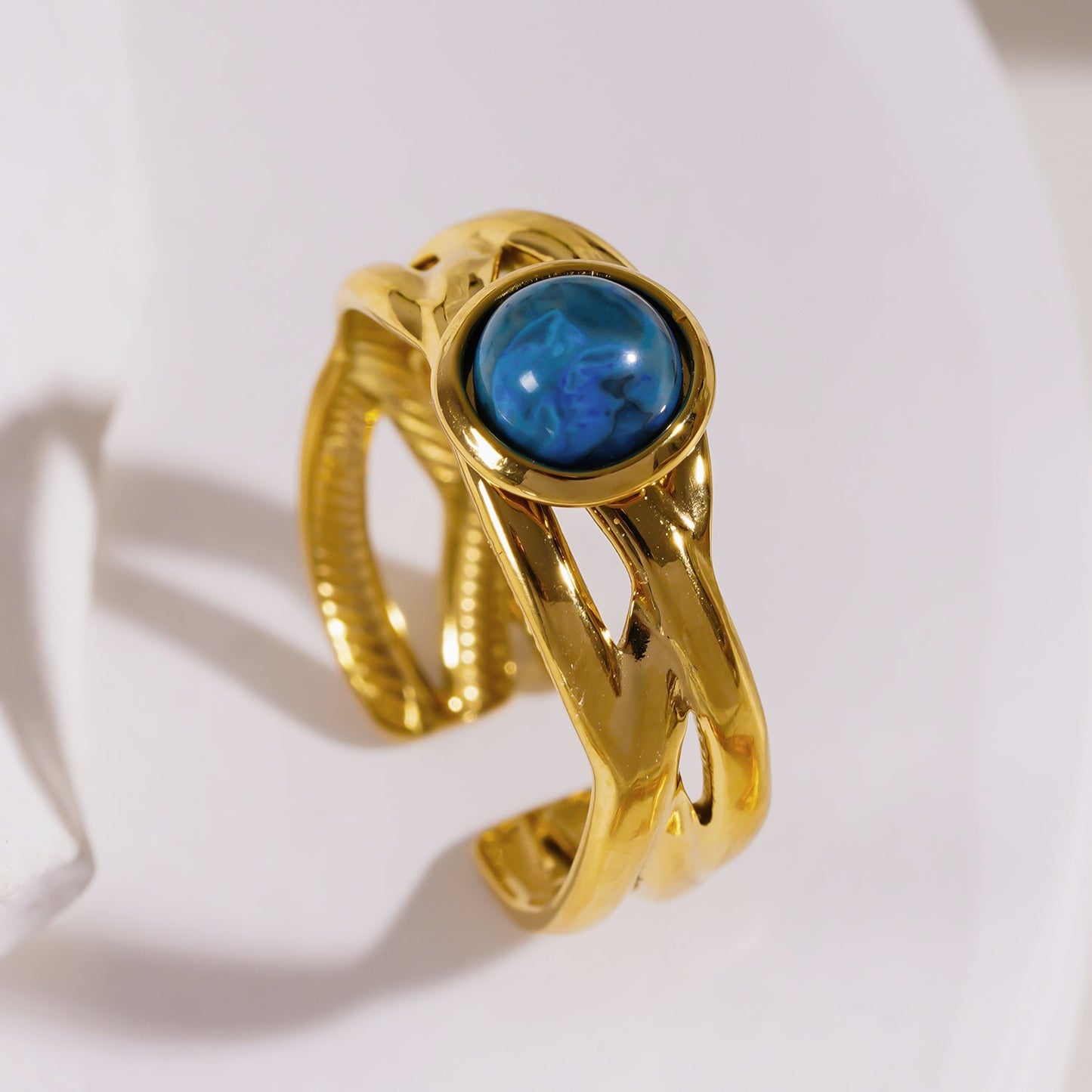 CHESA: Twisted Stacked Ring with Natural Stone Centre Piece.