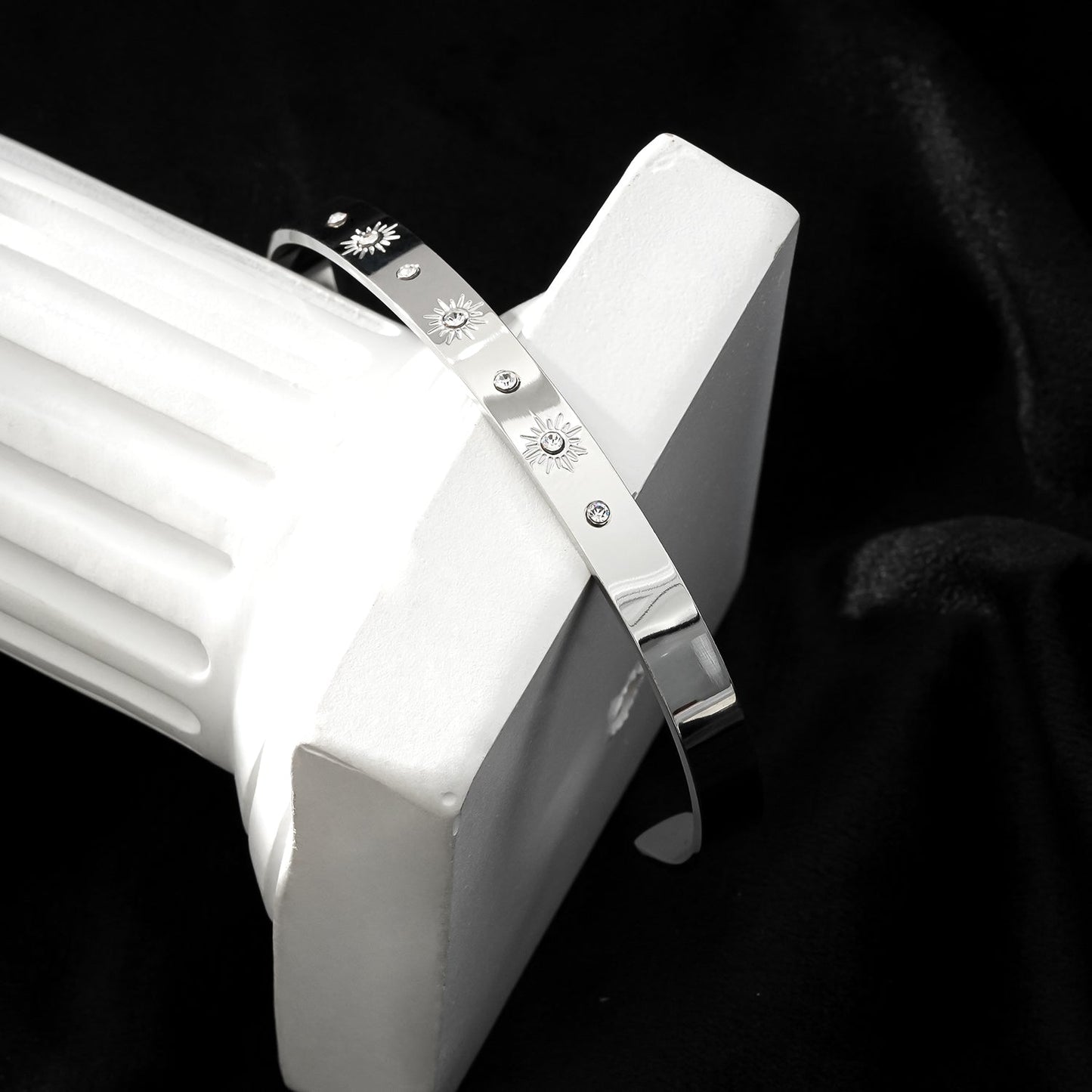 CHIMAKAK: Star-Engraved Zirconia Embedded Band Bracelet in Silver Toned White Gold