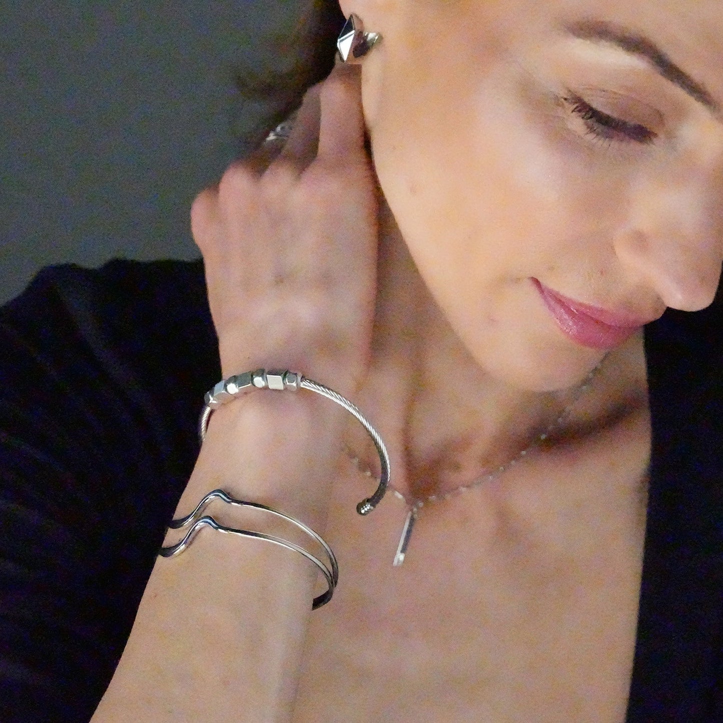 CHITRA: Industrial-Chic Bracelet with Abstract Shaped Parallel Bands in Silver Toned White Gold