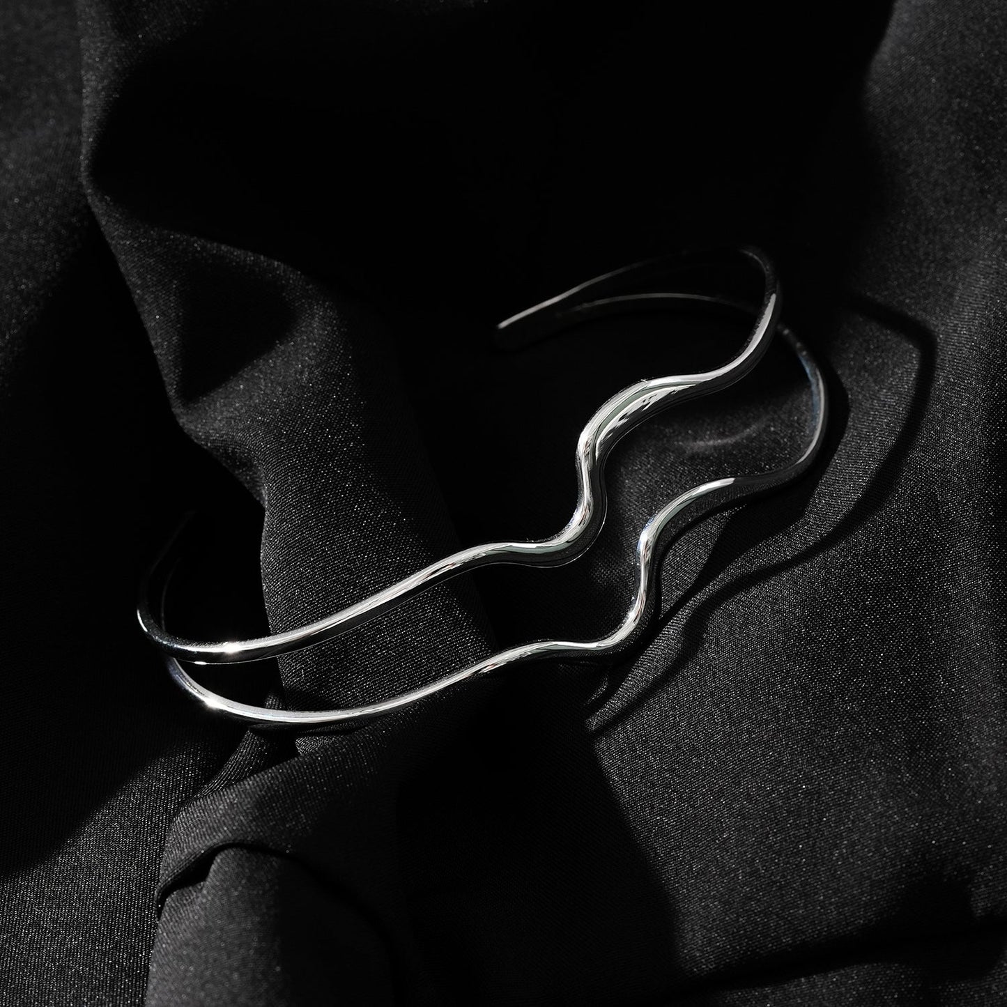 CHITRA: Industrial-Chic Bracelet with Abstract Shaped Parallel Bands in Silver Toned White Gold