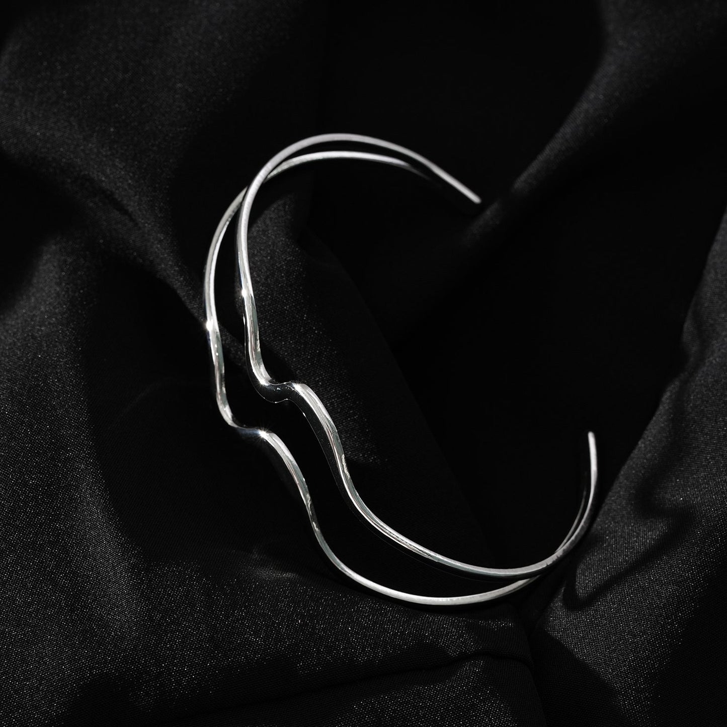 CHITRA: Industrial-Chic Bracelet with Abstract Shaped Parallel Bands in Silver Toned White Gold