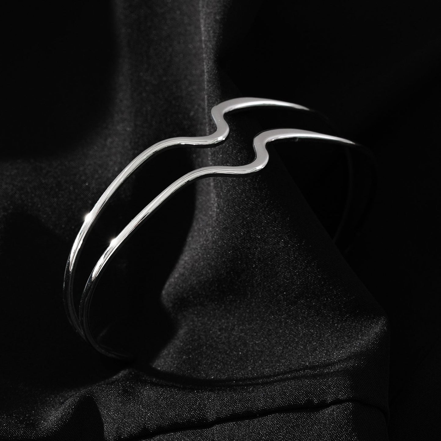 CHITRA: Industrial-Chic Bracelet with Abstract Shaped Parallel Bands in Silver Toned White Gold