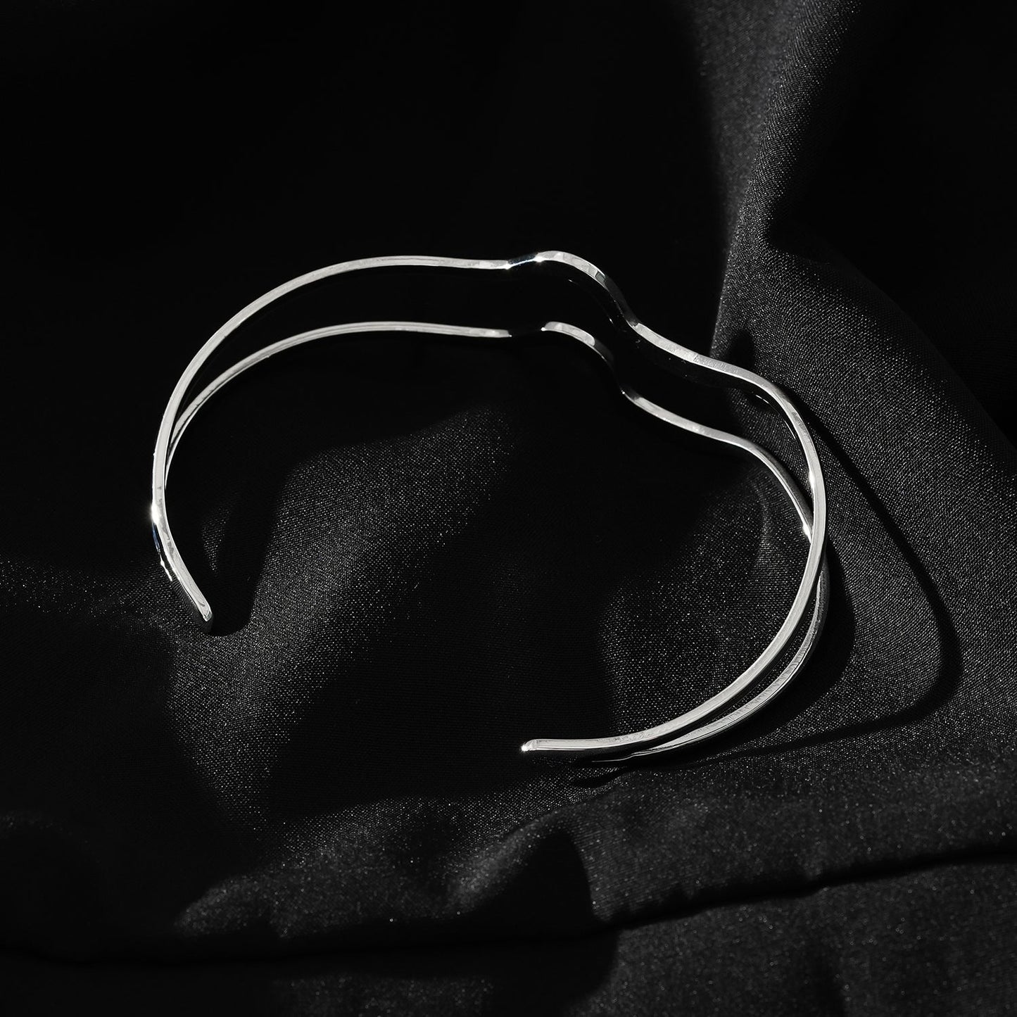 CHITRA: Industrial-Chic Bracelet with Abstract Shaped Parallel Bands in Silver Toned White Gold