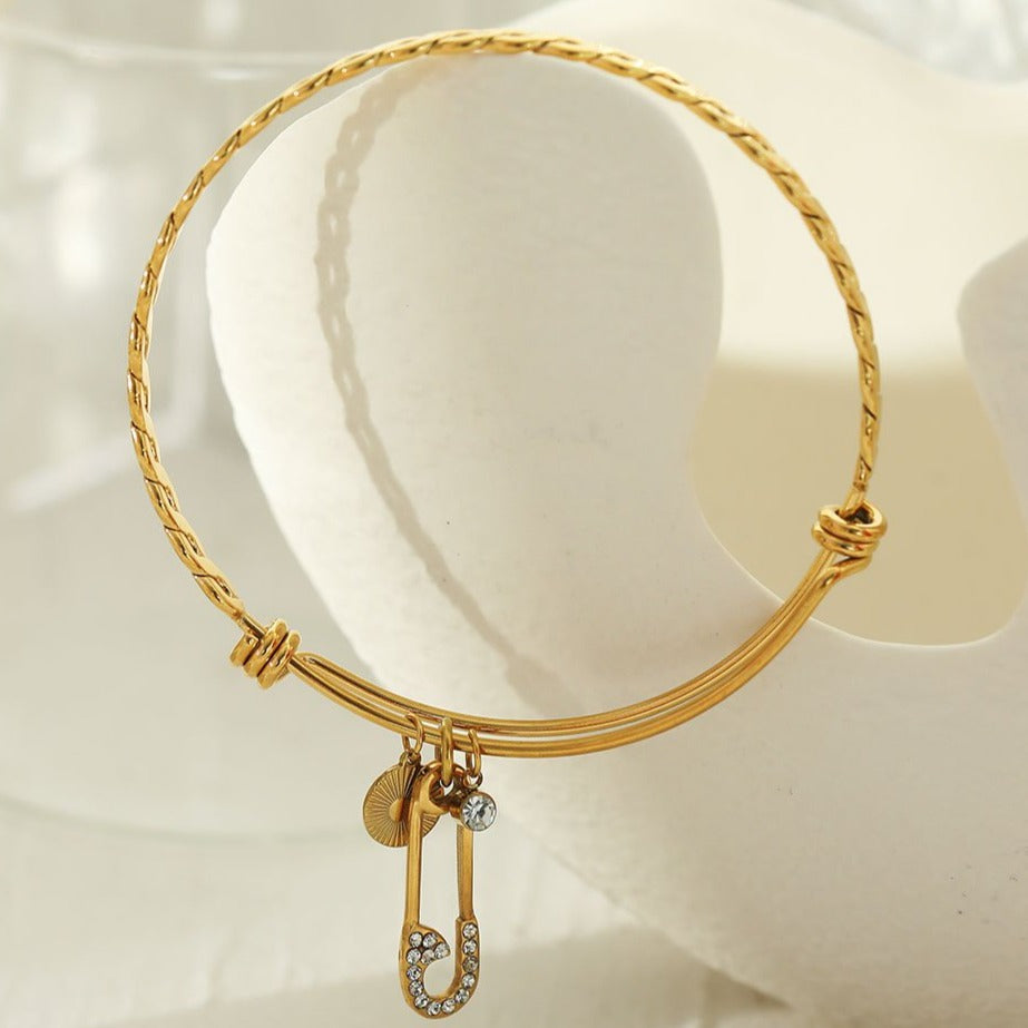 CHRISTINA: Charms Adorned Gold Bracelet