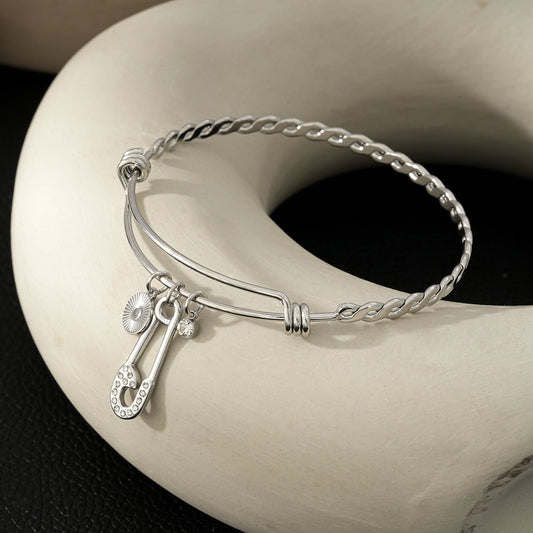 CHRISTINA: Charms Adorned White Gold (Silver Toned) Bracelet