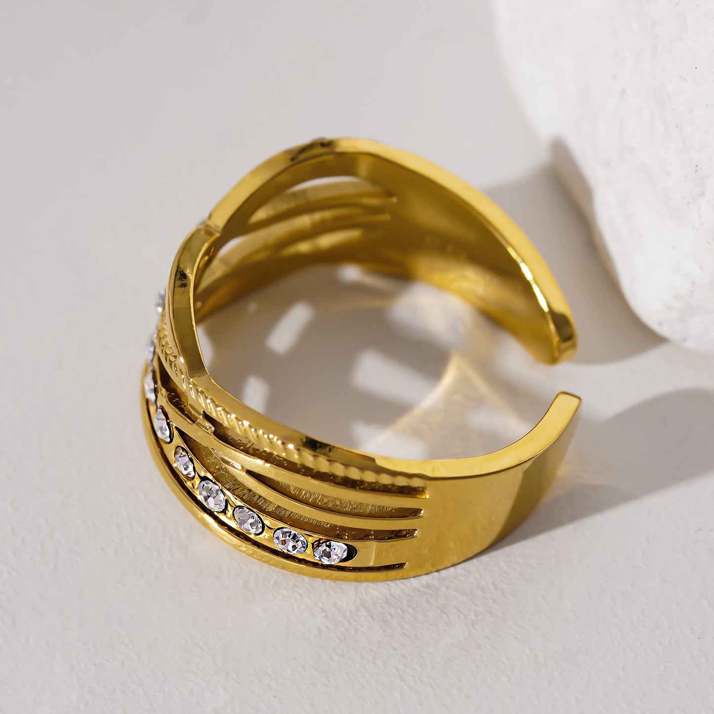 Style CORAZON: Cross Over Multi Stacked Zirconia Embedded Ring