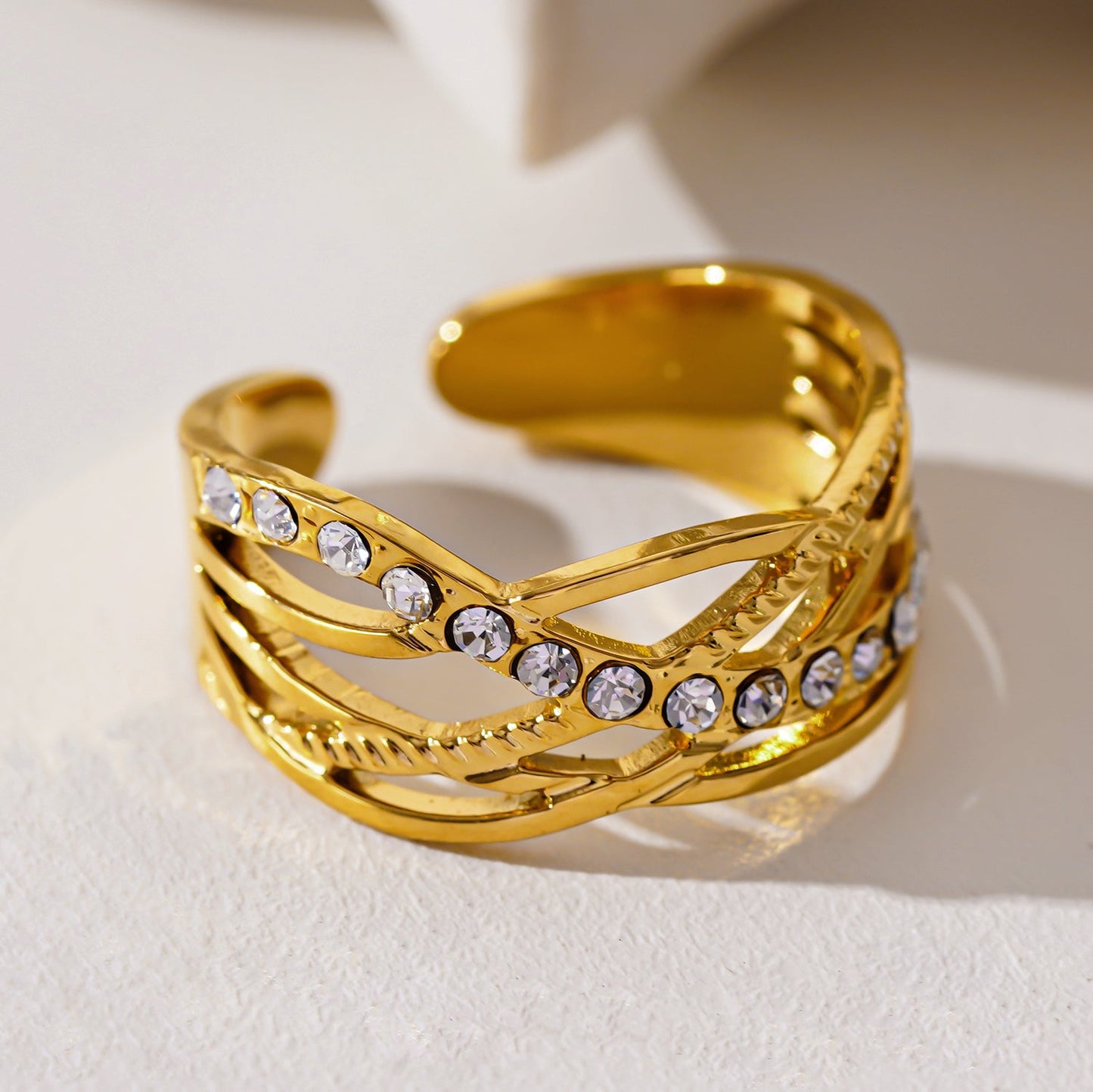 Style CORAZON: Cross Over Multi Stacked Zirconia Embedded Ring