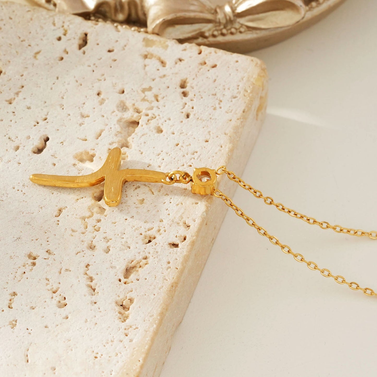 CRISTO Gold: Dainty Chain Necklace with a Zirconia Embedded Abstract Textured Cross Pendent