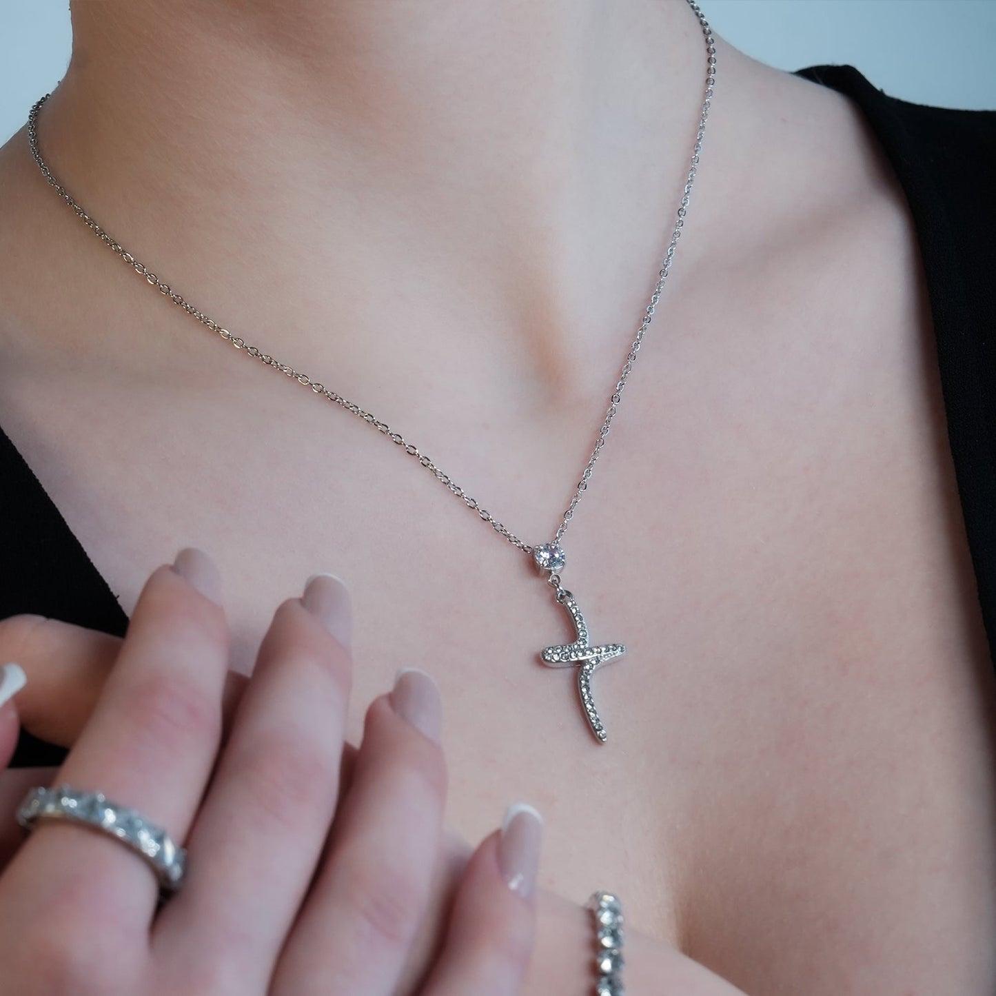 CRISTO Silver (White Gold): Dainty Chain Necklace with a Zirconia Embedded Abstract Textured Cross Pendent