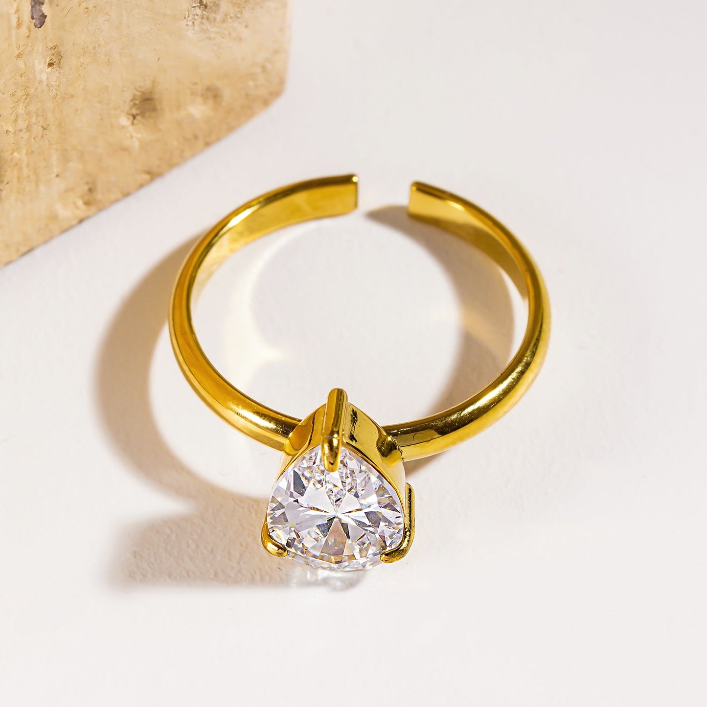DIMONDA: Classic Gold Ring with Prominent Teardrop Zirconia Centerpiece