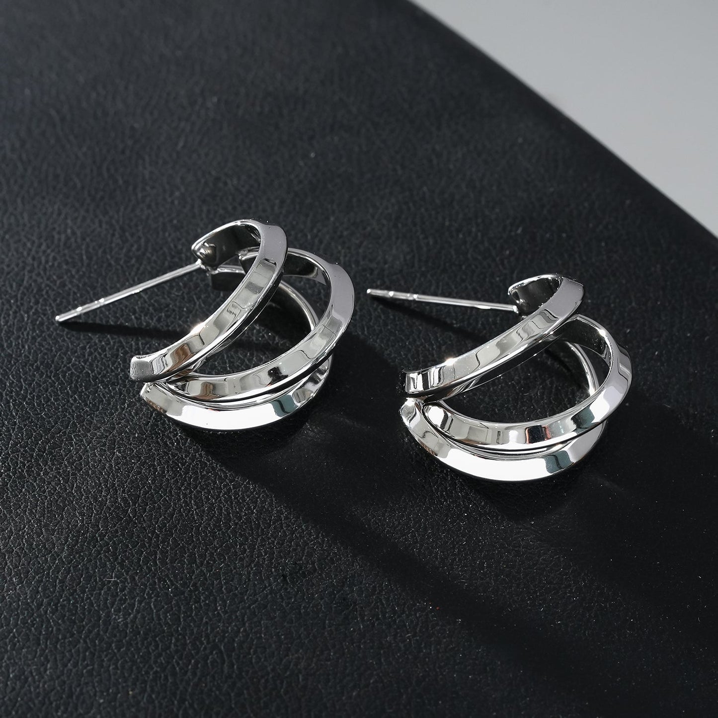 GRIZZANA: Triple Banded Hoop Earrings in Silver