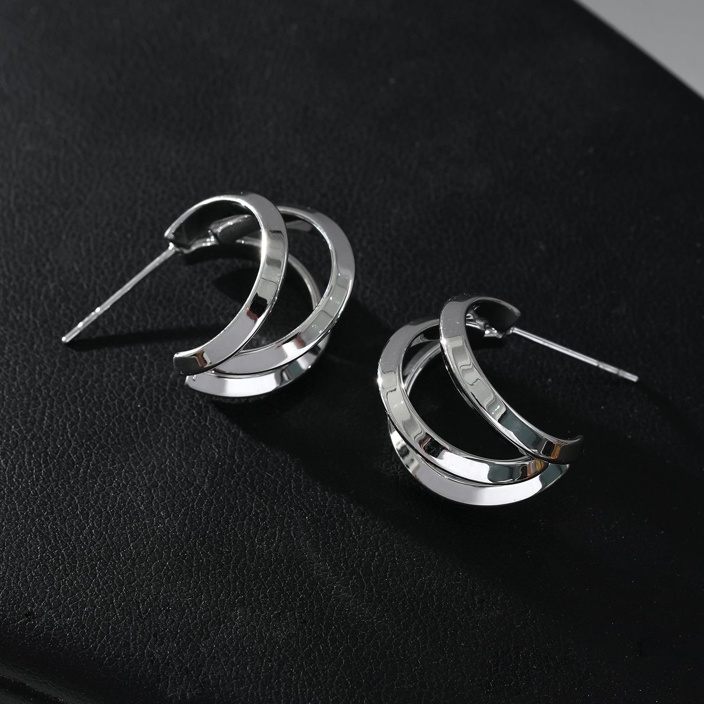 GRIZZANA: Triple Banded Hoop Earrings in Silver